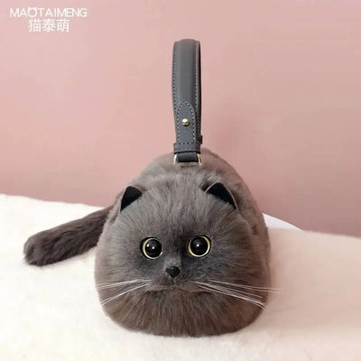 Süße graue Handtasche